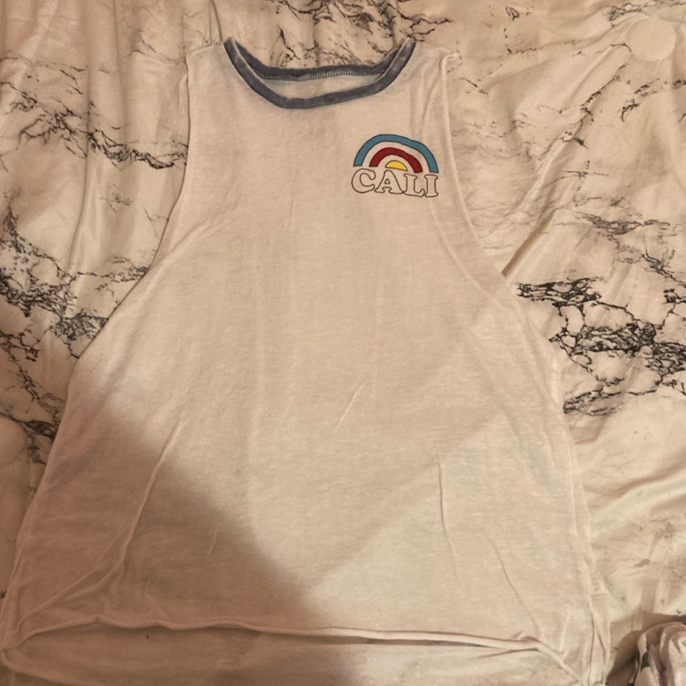 This is a see through muscle shirt very comfy